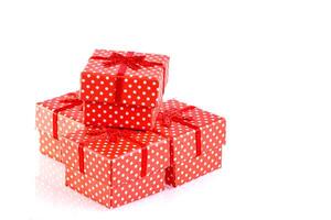 beautiful new year red gift boxes on white background photo