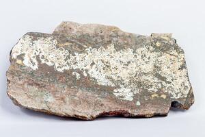 macro mineral bismuth stone on hartenstein schacht on white background photo