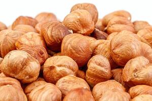 macro hazelnuts nuts on a white background photo