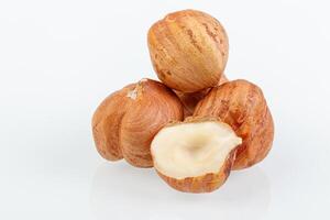 macro hazelnuts nuts on a white background photo