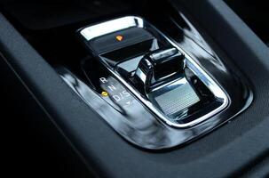 Modern automatic transmission mode selector with chrome details photo