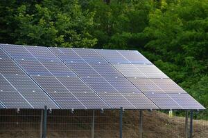 House roof with photovoltaic modules. photo