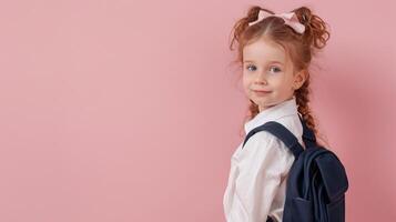 A little girl dressed in school uniform, blank pastel background photo