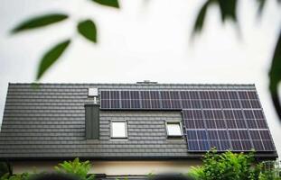 House roof with photovoltaic modules. photo