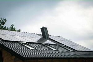 House roof with photovoltaic modules. photo