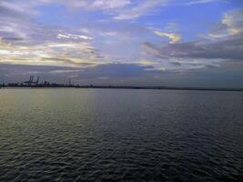 View from the boat to the seaport at sunset, Odessa, UA photo