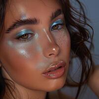 A female model with professional makeup on empty isolated background photo