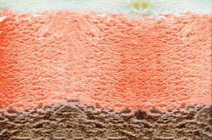 Closeup shot of an Ice cream with three different flavor photo