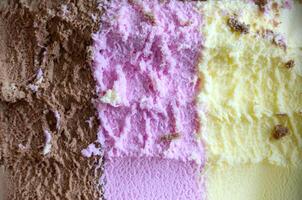 Closeup shot of an Ice cream with three different flavor photo