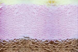 Closeup shot of an Ice cream with three different flavor photo