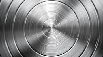 Metal background with a brushed circular pattern polished and shiny finish silver and light gray tones photo