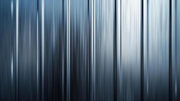 Smooth metal background with a gradient effect and subtle shine silver to dark gray tones photo