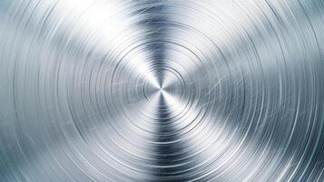 Metal background with a brushed circular pattern polished and shiny finish silver and light gray tones photo