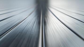 Smooth metal background with subtle gradient and reflective surface silver to light gray tones photo