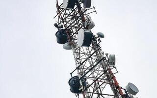 Red white 5G tower radiation in Playa del Carmen Mexico. photo