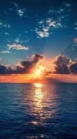 Sunset paints the sky with vibrant hues, reflecting on the calm water photo