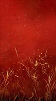 Silhouettes of tall grass against a vibrant red sky photo