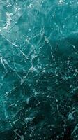 Calm blue water with white foam and bubbles photo