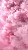 Soft pink clouds drift gently, creating a dreamy and ethereal atmosphere photo