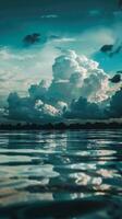 Cloudscape reflected on calm waters photo