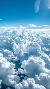 White clouds float across the sky photo