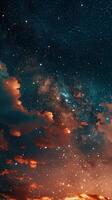 Orange and blue clouds in a starry sky photo