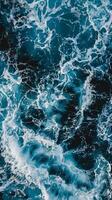Foamy ocean waves from above photo