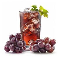 A glass of grape juice with ice cubes and grapes photo