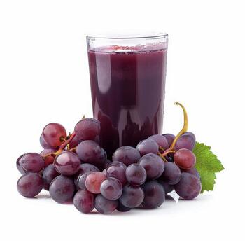 A glass of grape juice and grapes on a white background photo