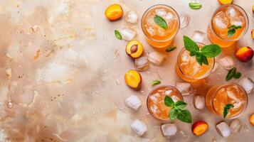 Icy apricot nectar with mint garnish and ice cubes on a rustic background photo