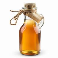 Kombucha beverage in a glass bottle with a burlap cover photo
