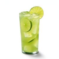 A tall glass of limeade with ice cubes and lime slices photo
