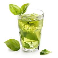 Green tea with ice and basil leaves photo