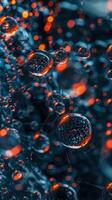 Close-up of sparkling dewdrops on a spiderweb, illuminated with vibrant orange light photo