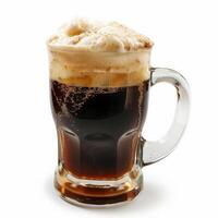 Close-up of a root beer beverage in a clear glass mug with a thick head of foam photo