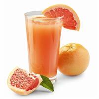 A glass of grapefruit juice with a grapefruit slice and a whole grapefruit photo