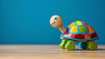A colorful wooden turtle toy sits on a desk, ready for playtime photo