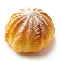 A single golden pastry with a star-shaped design, dusted with powdered sugar photo