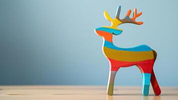 A colorful wooden deer toy stands on a desk, ready for a new adventure photo