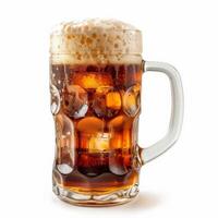 A glass mug filled with root beer and ice, topped with a creamy head of foam photo