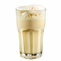 A glass of buttermilk with a thick layer of foam on top photo