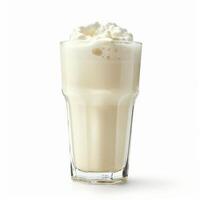 Buttermilk beverage with whipped cream topping in a clear glass, isolated on white photo