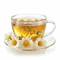 Teacup with chamomile tea sits on saucer with daisies photo