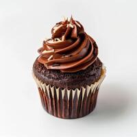 A close-up of a chocolate cupcake with a swirl of chocolate frosting and sprinkles photo
