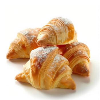 dorado marrón croissants espolvoreado con en polvo azúcar foto