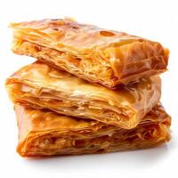 Golden brown phyllo pastry, layered and ready to be enjoyed photo