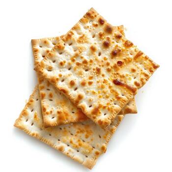 Three matzo crackers stacked on a white background photo