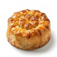 A close-up of a golden pastry, showcasing its intricate layers and delicate crust photo