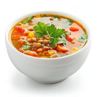 A bowl of lentil soup with vegetables and parsley garnish photo