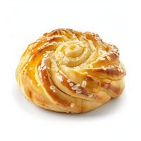 Golden brown Danish pastry with white swirl topping ready to eat photo